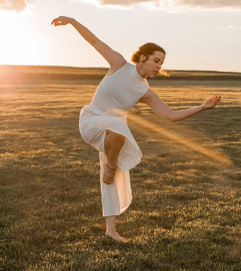 Illustration of energy flowing through a person during a yoga pose.